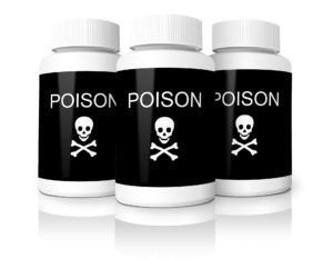 Drei Pillenbehälter mit der Aufschrift Poison